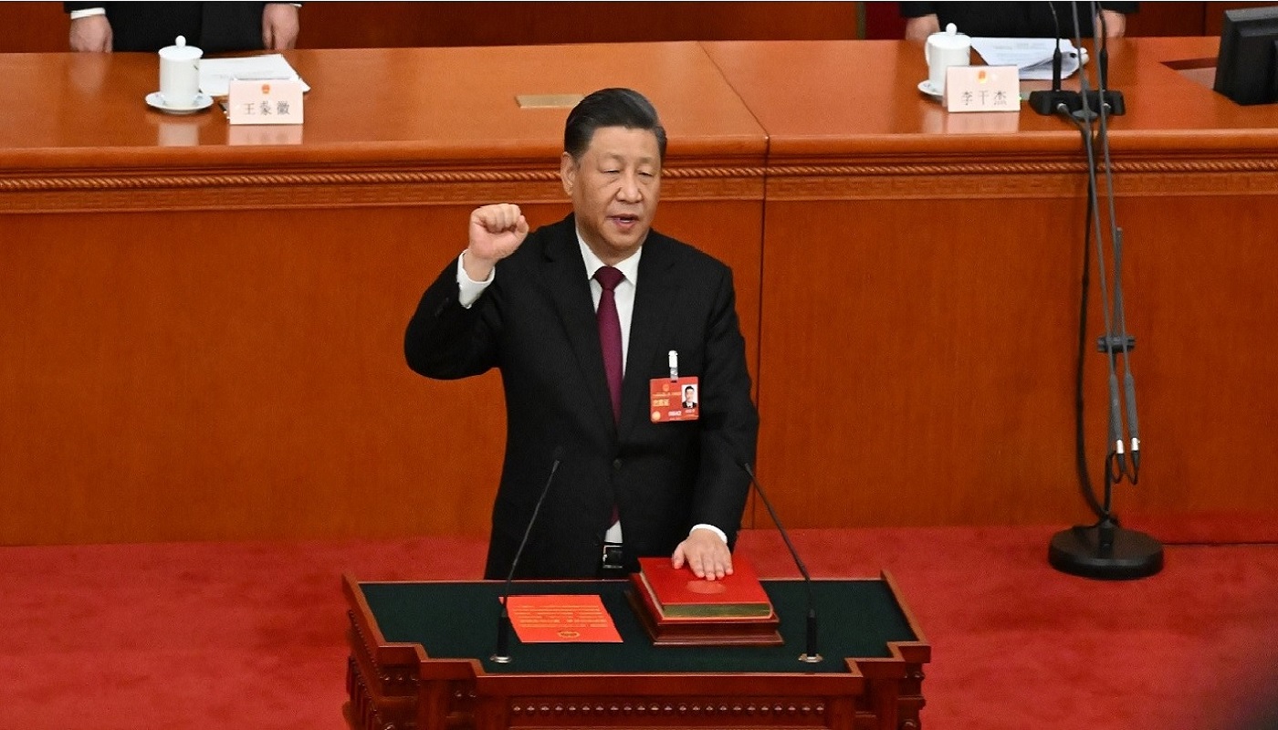 China's President Xi Jinping  swears under oath after being re-elected as president for a third term
